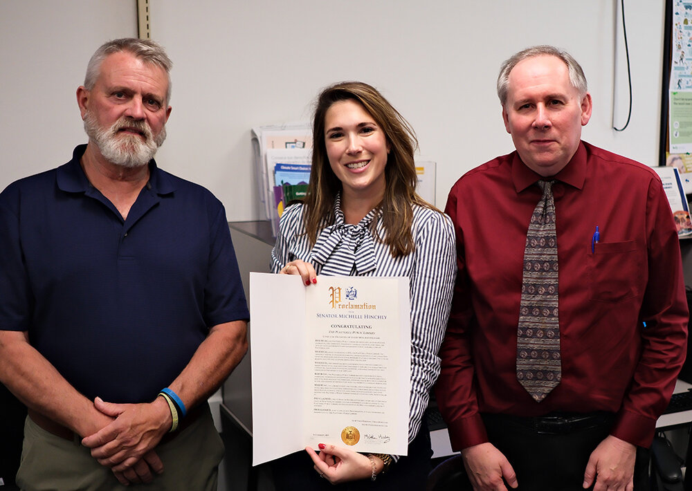 Sen. Michelle Hinchey presented the Plattekill Library with a Proclamation in honor of 50 years of service to the community. She is flanked by Library Trustee President William Farrell [L] and Library Director Darren Lanspery.